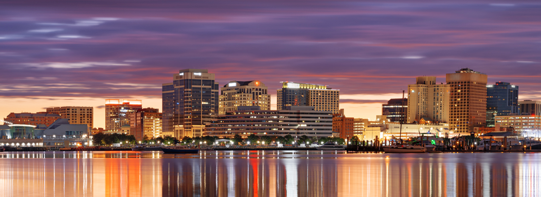 downtown norfolk skyline at dusk