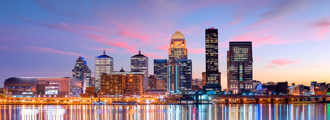 downtown louisville skyline at dusk