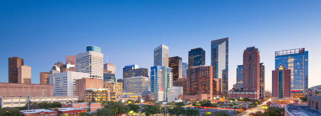 downtown houston skyline at dusk